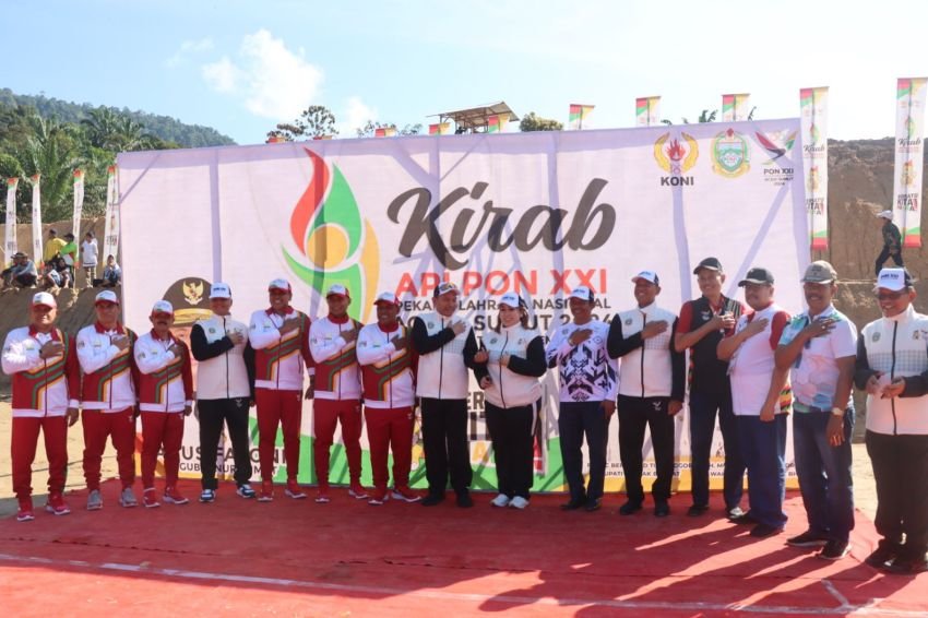 Kapolres Pakpak Bharat Hadiri Upacara serah Terima Api PON XXI Aceh-Sumut Di Desa Perolihen